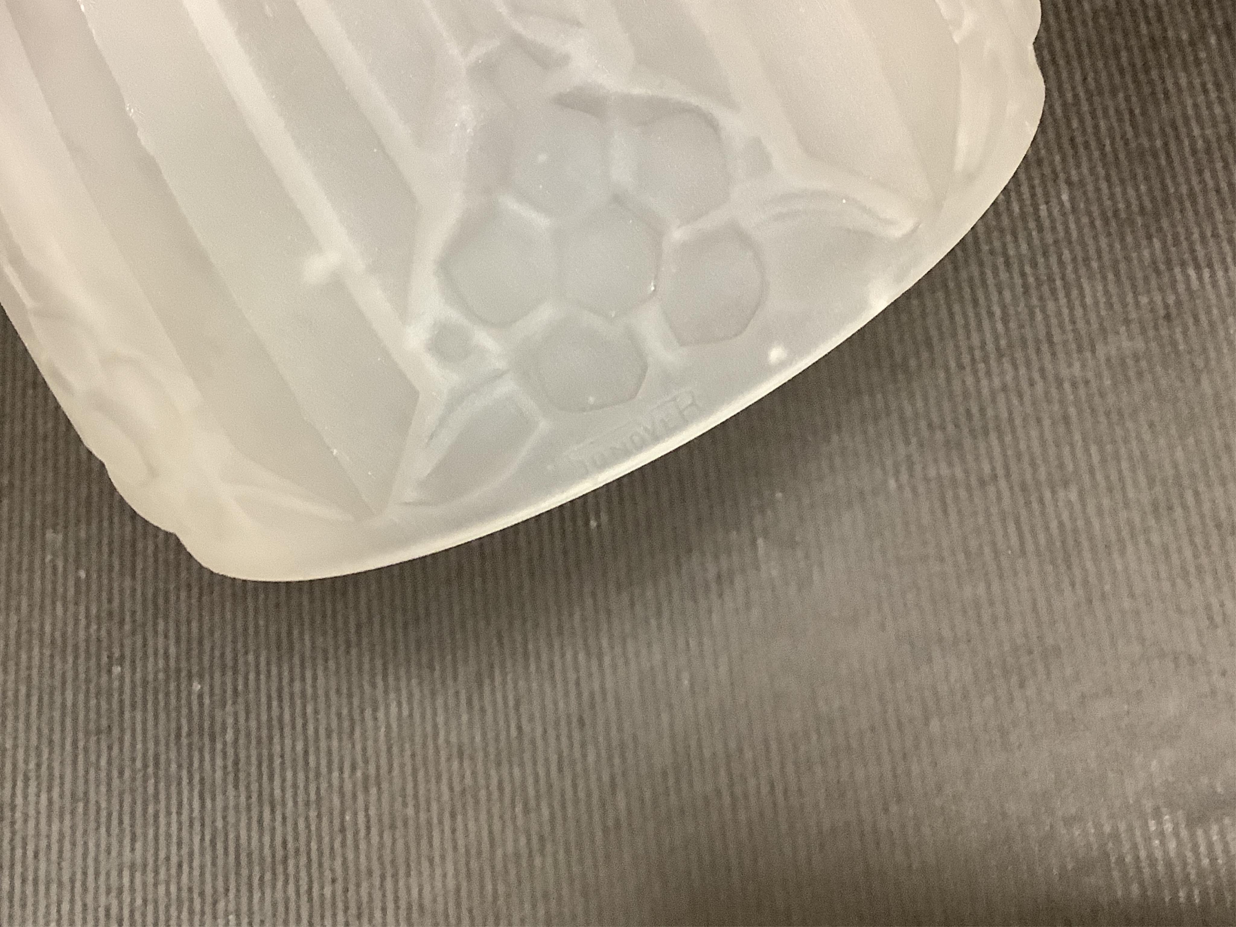 An Art Deco wrought iron and frosted glass mushroom lamp, signed Sonover to the shade, 35cm high